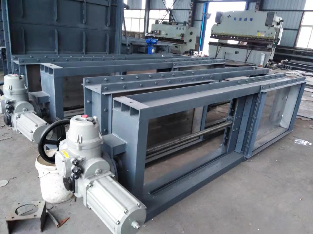 Rectangular sliding-gate isolation dampers with electric actuators